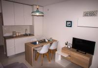 Kuchyňa alebo kuchynka v ubytovaní Ceratonia Apartments
