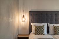 Posteľ alebo postele v izbe v ubytovaní SOFTALPIN Garden Suites