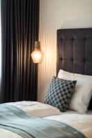 Posteľ alebo postele v izbe v ubytovaní SOFTALPIN Garden Suites