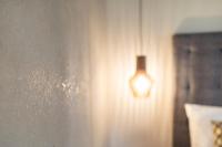 Posteľ alebo postele v izbe v ubytovaní SOFTALPIN Garden Suites