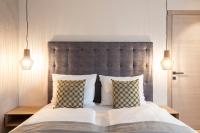 Posteľ alebo postele v izbe v ubytovaní SOFTALPIN Garden Suites
