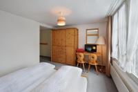 Postel nebo postele na pokoji v ubytování Hotel Krone Budget