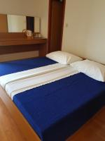 Postel nebo postele na pokoji v ubytování Guest House Vukušić