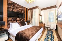 Postel nebo postele na pokoji v ubytování Eastanbul Suites