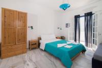 Postel nebo postele na pokoji v ubytování Antonina Hotel