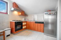 Kuchyň nebo kuchyňský kout v ubytování Apartments Janjac
