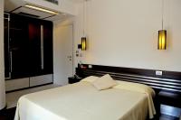 Łóżko lub łóżka w pokoju w obiekcie Hotel Le Piane