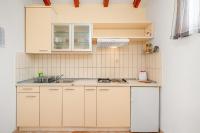 Kuchyň nebo kuchyňský kout v ubytování Apartments Janjac