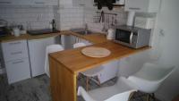 Kuchyň nebo kuchyňský kout v ubytování Apartament Leśny
