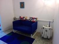 A seating area at mansarda pieno centro
