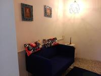 A seating area at mansarda pieno centro