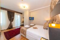 Postel nebo postele na pokoji v ubytování Eastanbul Suites