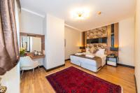 Postel nebo postele na pokoji v ubytování Eastanbul Suites