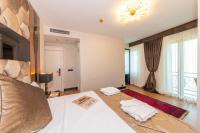 Postel nebo postele na pokoji v ubytování Eastanbul Suites