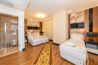 Postel nebo postele na pokoji v ubytování Eastanbul Suites
