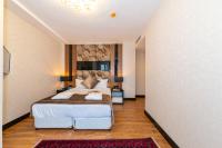 Postel nebo postele na pokoji v ubytování Eastanbul Suites