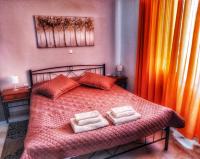 Posteľ alebo postele v izbe v ubytovaní Aggeliki Apartments