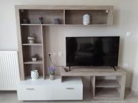 Televízia a/alebo spoločenská miestnosť v ubytovaní Aggeliki Apartments