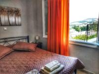 Posteľ alebo postele v izbe v ubytovaní Aggeliki Apartments