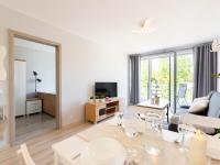 Telewizja i/lub zestaw kina domowego w obiekcie VacationClub - Pionierów 6, Apartament 25