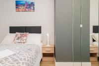 Posteľ alebo postele v izbe v ubytovaní Stare Bielany 2-Bedroom Apartment