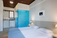 Postel nebo postele na pokoji v ubytování Magia Apartments