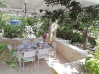 Vonkajšia záhrada v ubytovaní Appartamento Gardenia in Villa Mariella