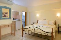 Postel nebo postele na pokoji v ubytování Ammoudara Beach Hotel Apartments