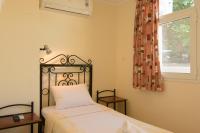 Postel nebo postele na pokoji v ubytování Ammoudara Beach Hotel Apartments