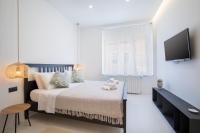 Postel nebo postele na pokoji v ubytování Twins Idola Apartments