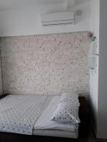 Posteľ alebo postele v izbe v ubytovaní Apartmani MATKO