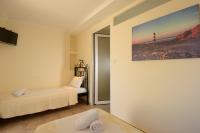 Postel nebo postele na pokoji v ubytování Ammoudara Beach Hotel Apartments