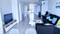 A television and/or entertainment centre at Cabo Mar Duplex