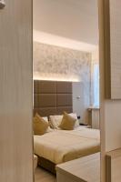 Agape Hotel AA Hotelsにあるベッド