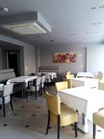 A seating area at Rg Status Hotel