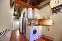 A kitchen or kitchenette at La Buhardilla de Andrea
