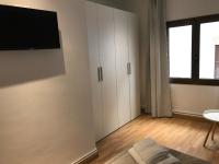TV a/nebo společenská místnost v ubytování Hostal Casiano Camarasa