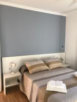 Postel nebo postele na pokoji v ubytování Hostal Casiano Camarasa