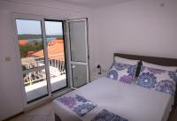 Posteľ alebo postele v izbe v ubytovaní Ceratonia Apartments