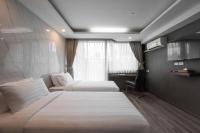 Postel nebo postele na pokoji v ubytování Bangkok City Link Hotel