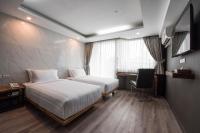 Postel nebo postele na pokoji v ubytování Bangkok City Link Hotel