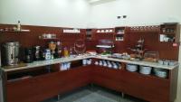 A kitchen or kitchenette at Marie Hotel