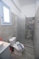 Kúpeľňa v ubytovaní Studios Akrogiali
