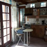 A kitchen or kitchenette at VLASSIS APTS -ΜΕΛΙΔΟΝΙ-ΔΙΑΜΕΡΙΣΜΑ ΒΑΣΙΛΙΚΗ