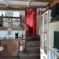 A kitchen or kitchenette at VLASSIS APTS -ΜΕΛΙΔΟΝΙ-ΔΙΑΜΕΡΙΣΜΑ ΒΑΣΙΛΙΚΗ