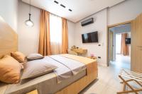 TV a/nebo společenská místnost v ubytování Casa Antika Suites
