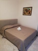 Posteľ alebo postele v izbe v ubytovaní A Casa di Carla e Lucia