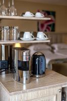 スイーテンホテル パルコ パラディソにあるコーヒーまたはお茶