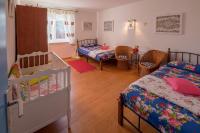 Postel nebo postele na pokoji v ubytování House Nina