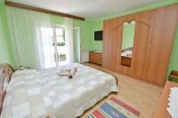 Posteľ alebo postele v izbe v ubytovaní Apartment Evan